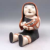 Polychrome storyteller with one child
 by Ada Suina of Cochiti