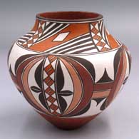 Polychrome jar with a “Rainbows” design from around 1885
 by Wanda Aragon of Acoma