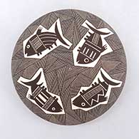 Black and white seed pot with a Mimbres fish and geometric design
 by Rebecca Lucario of Acoma