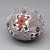 Polychrome seed pot with a turtle and fine line geometric design
 by Lisa Little of Acoma