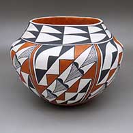 Polychrome jar with six panel geometric design
 by Monica Chino of Acoma