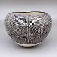 Black and white jar with a fine line and geometric design
 by Lucy Lewis of Acoma