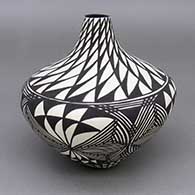 Black and white jar with a fine line and geometric design
 by Sandra Victorino of Acoma
