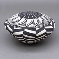 Black and white seed pot with a feather ring and geometric design
 by Cletus Victorino of Acoma