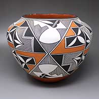 A polychrome jar decorated with a four-panel fine line and geometric design
 by Adrian Vallo of Acoma