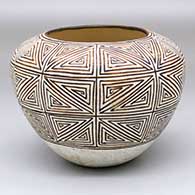A black fine line geometric design on a white jar
 by Unknown of Acoma