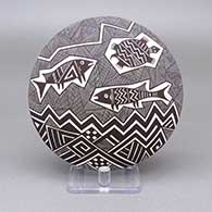 Black-on-white seed pot with a Mimbres fish, turtle, checkerboard, fine line, and geometric design
 by Rebecca Lucario of Acoma
