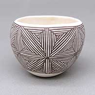 Small black-on-white jar with a snowflake fine line geometric design
 by Barbara Cerno of Acoma