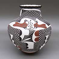Polychrome jar with a pie crust opening and a painted parrot, berry, checkerboard, fine line, and geometric design; based on a historical piece
 by Lilly M Salvador of Acoma