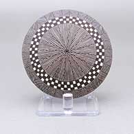 Black-on-white seed pot with a checkerboard, fine line, and geometric design
 by Rebecca Lucario of Acoma