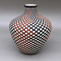 Polychrome jar with a pie crust opening and a checkerboard and geometric design
 by Paula Estevan of Acoma