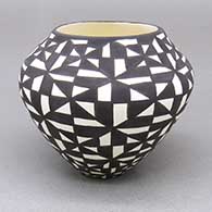 Small black-on-white jar with a geometric design
 by Sandra Victorino of Acoma