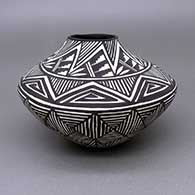 Black-on-white jar with a painted fine line and geometric design
 by Sandra Victorino of Acoma