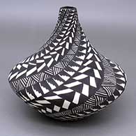 Black-on-white jar with a painted fine line, kiva step, and geometric design
 by Sandra Victorino of Acoma