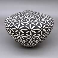 Large black-on-white seed pot with a painted geometric design
 by Sandra Victorino of Acoma