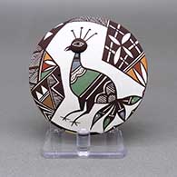 Polychrome seed pot with an applique and painted peacock, fine line, and geometric design on top and an applique and painted ladybug detail on bottom
 by Carolyn Concho of Acoma