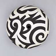 Black-on-white seed pot with a painted bold geometric design
 by Eric Lewis of Acoma
