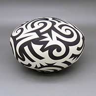 Large black-on-white seed pot with a painted bold geometric design
 by Eric Lewis of Acoma