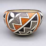 Polychrome bowl with a fine line, kiva step, and geometric design
 by Lucy Lewis of Acoma