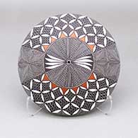 Polychrome seed pot with a feather, fine line, and geometric design
 by Rebecca Lucario of Acoma