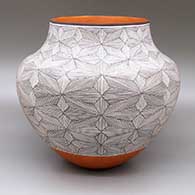 Large polychrome jar with a fine line geometric design
 by Robert Patricio of Acoma