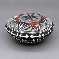 Polychrome seed pot with a fine line, feather, and geometric design
 by Cletus Victorino of Acoma