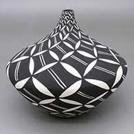 Black-on-white seed pot with a geometric design
 by Sandra Victorino of Acoma