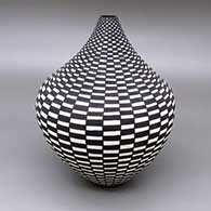 Black-on-white jar with a checkerboard geometric design
 by Sandra Victorino of Acoma