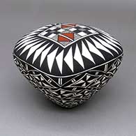 Polychrome seed pot with a square shape and a fine line, feather ring, and geometric design
 by Cletus Victorino of Acoma