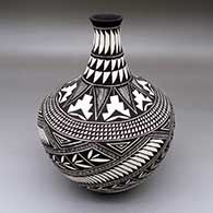 A polychrome high-neck jar with an eight-panel geometric design
 by Sandra Victorino of Acoma