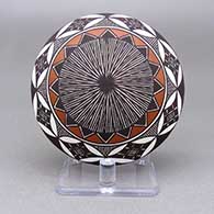 Small polychrome seed pot with a fine line and geometric design
 by Amanda Lucario of Acoma