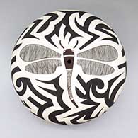Large black-on-white seed pot with a dragonfly, fine line, and bold geometric design
 by Eric Lewis of Acoma