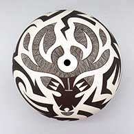 Black-on-white seed pot with a deer, fine line, and bold geometric design
 by Eric Lewis of Acoma