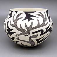 Black-on-white jar with a deer, fine line, and bold geometric design
 by Eric Lewis of Acoma