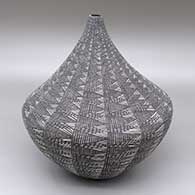 Black-on-white seed pot with a fine line geometric design
 by Sandra Victorino of Acoma