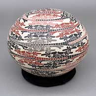 Polychrome seed pot with a sgraffito and painted crocodile design
 by Efren Ledezma of Mata Ortiz and Casas Grandes