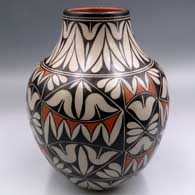 Polychrome jar with a raised rim and a geometric design
 by Lisa Holt of Cochiti and Santo Domingo