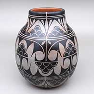 Polychrome jar with a geometric design
 by Lisa Holt of Cochiti