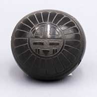 Black seed pot with Tewa Sun sgraffito designL19
 by Wallace Youvella of Hopi