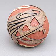 Polychrome seed pot with a lightly carved, sgraffito, and painted geometric design
 by Thomas Polacca of Hopi
