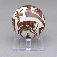 Small sienna seed pot with a sgraffito Mimbres antelope, cornstalk, and geometric design
 by Carla Nampeyo of Hopi
