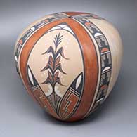 A polychrome seed pot decorated with a four-panel corn plant, rainbow and geometric design
 by Virginia Ponca Fragua of Jemez