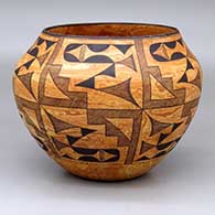 A mixed clay jar decorated with a 6-panel geometric design in black
 by Calvin Analla Jr of Laguna