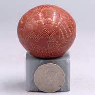 Miniature red seed pot with a sgraffito Mimbres bird, animal, insect and geometric designJ51
 by Susan Romero of Santa Clara