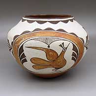 Polychrome jar with a road runner, checkerboard, and geometric design
 by Seferina Bell of Zia