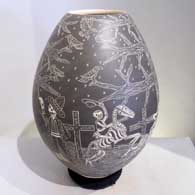 Black and white jar etched in the sgraffito technique with a Night of the Dead motif