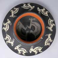 Polychrome jar with Mimbres rabbit and geometric design, inside and out