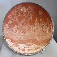 Sgraffito Night of the Dead motif on a red and white bowl