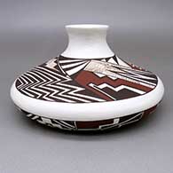 A polychrome low-shouldered jar with a recurved neck and a fine line, kiva step, lightning bolt, and geometric design