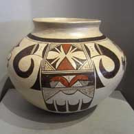 An eagletail and geometric design on a polychrome pot